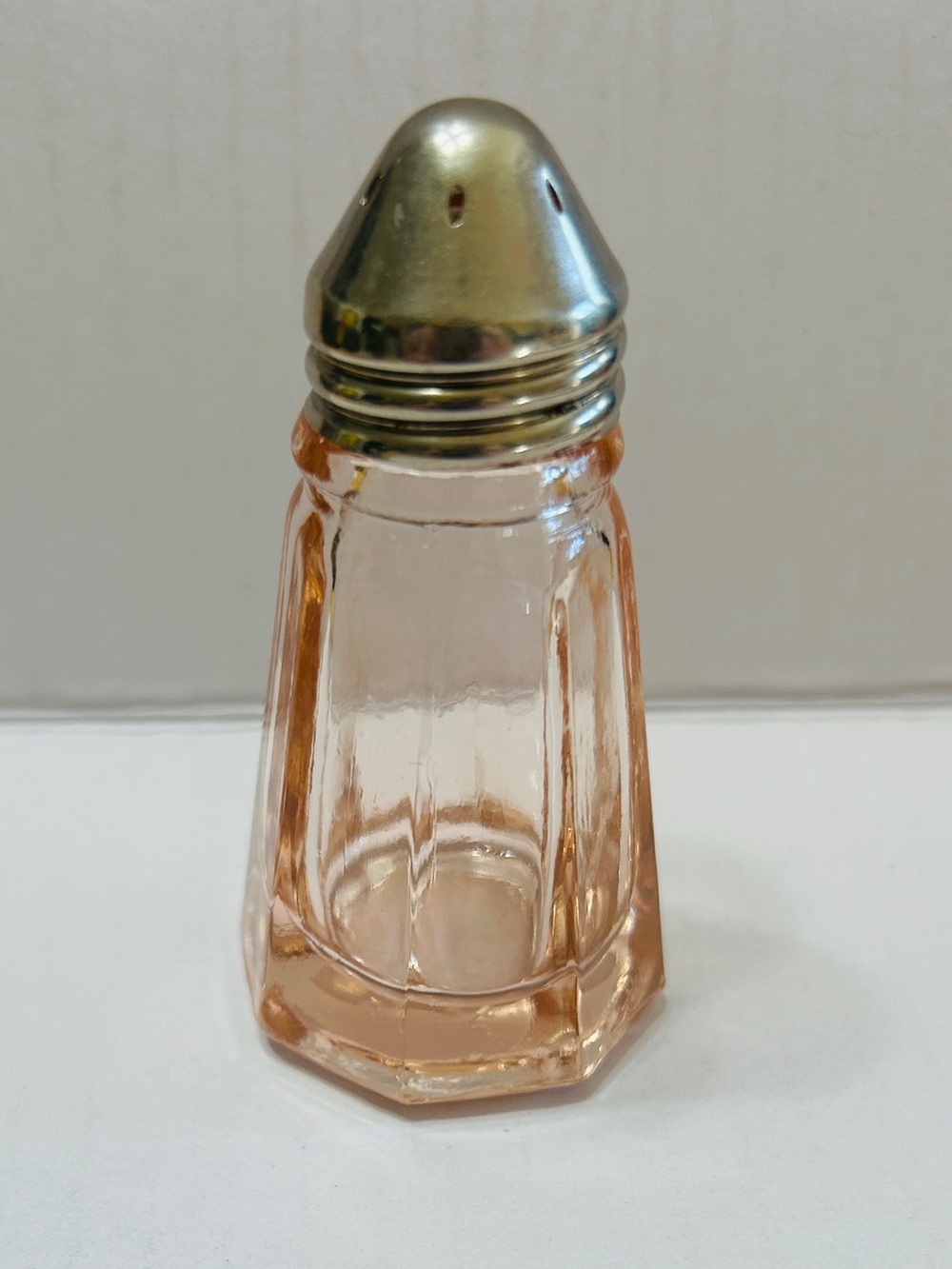 Vintage shaker in pale rose color. 1930’s Hazel Atlas glass.